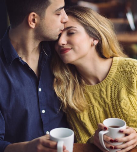 Couple In Love Drinking Coffee In Coffee Shop