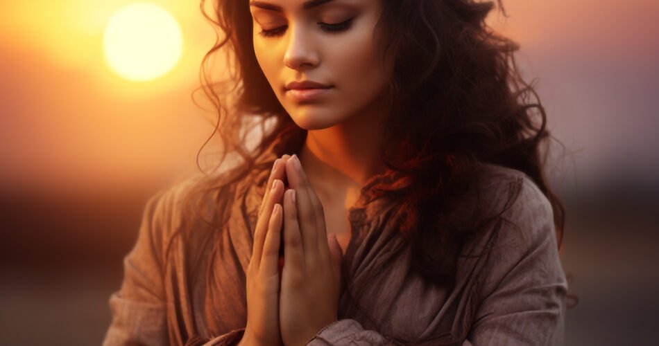 Woman Praying To God During Sunset
