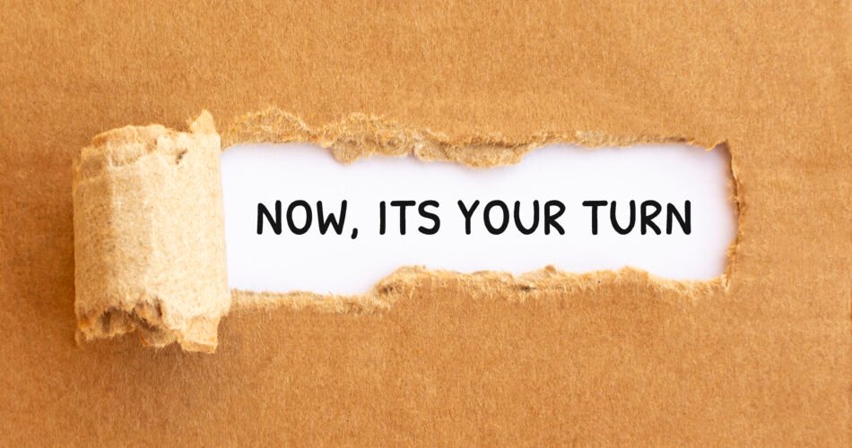 Text Now, Its Your Turn Appearing Behind Torn Brown Paper